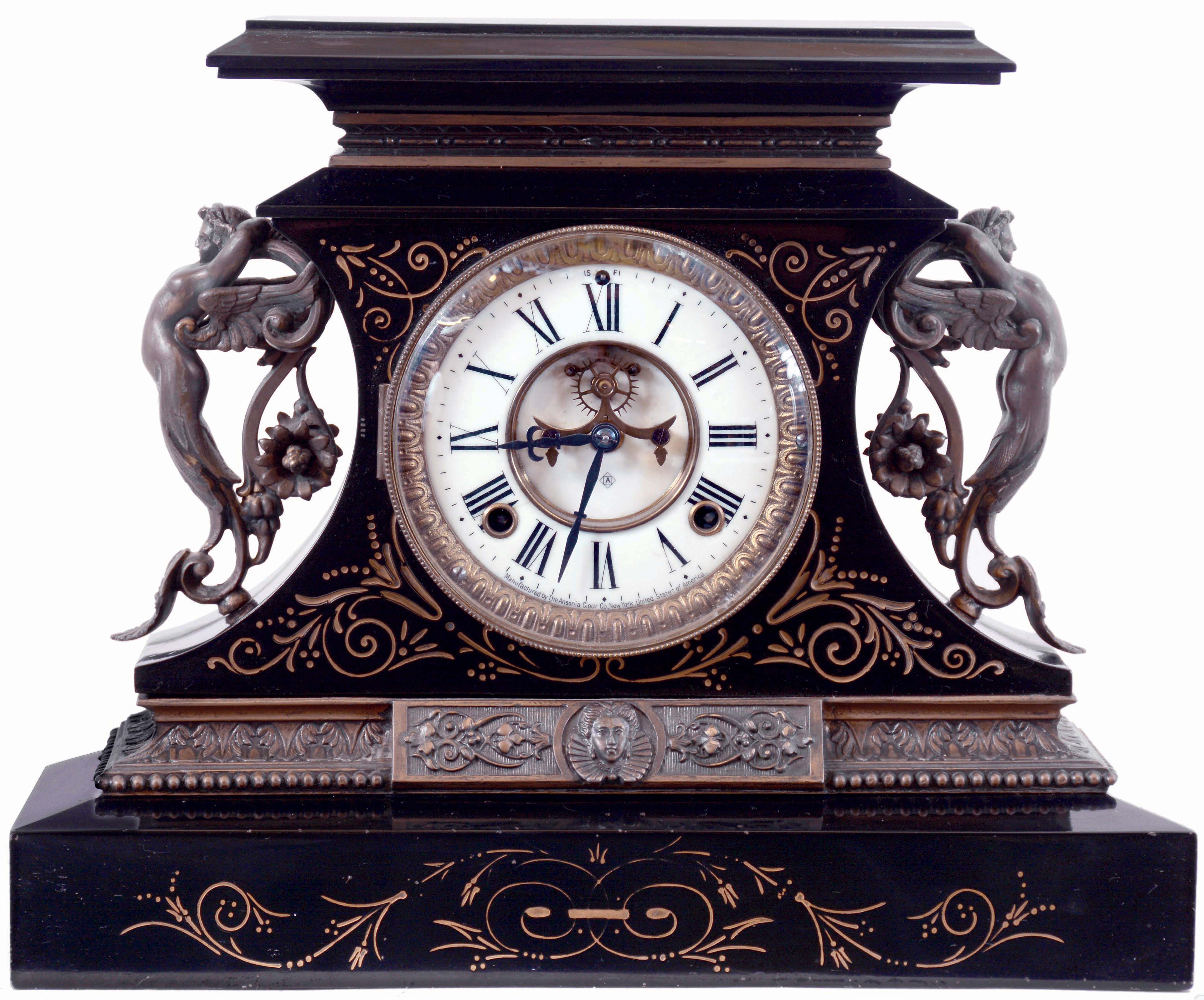 Ansonia Clock Co., New York, NY, "Rosalind" enameled iron case mantel clock with a spring driven, 8 days, time and hour/half-hour strike movement with a visible escapement, c1904. — Antique Clocks Price Guide