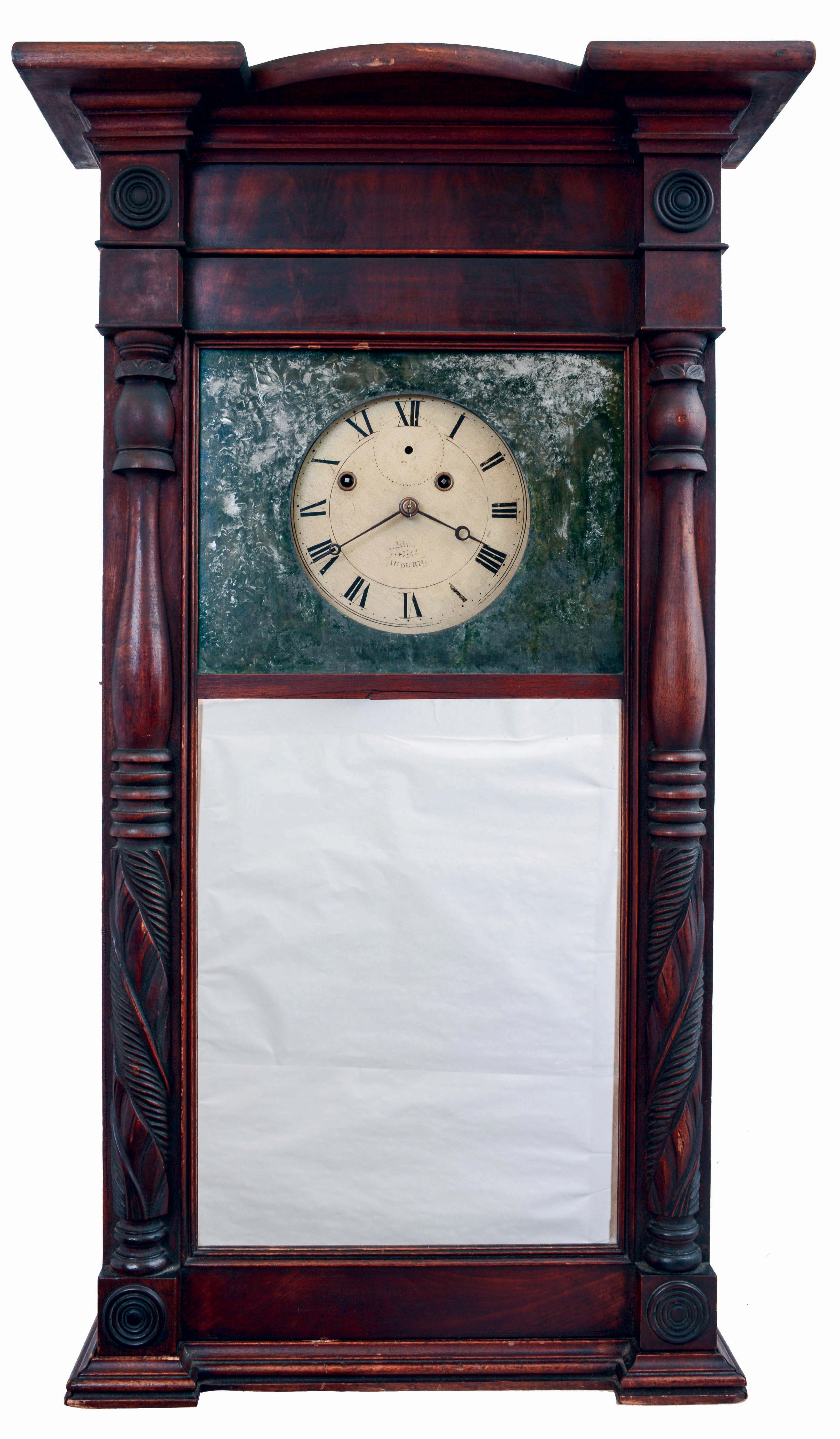 Asa Munger, Auburn, New York, so-called "Ironing Board Top" Empire carved column shelf clock with 8 day, weight driven, time and strike brass movement in a butternut case with mahogany veneer, c1830. — Antique Clocks Price Guide