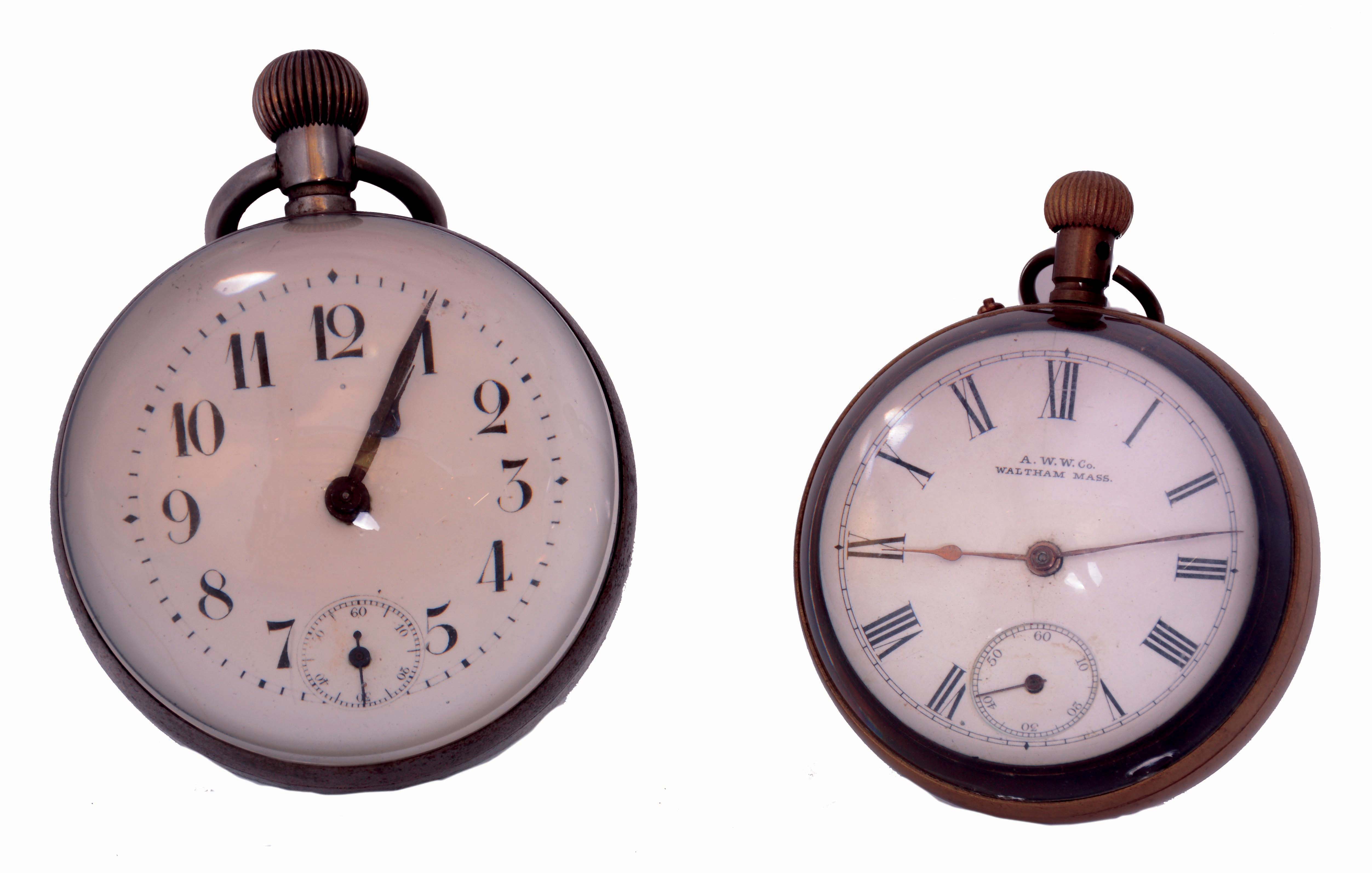 Clocks- 2 (Two): Paperweight clocks, one with nickel plated case fitted with spherical glass, Arabic numeral white enamel dial, blued steel spade and poker hands, 30 hour lever movement marked "France", c1900, the other in brass case fitted with spherical glasses, now with Roman numeral enamel dial signed "A. W. W. Co. Waltham, Mass.", Swiss, 30 hour lever movement — Antique Clocks Price Guide
