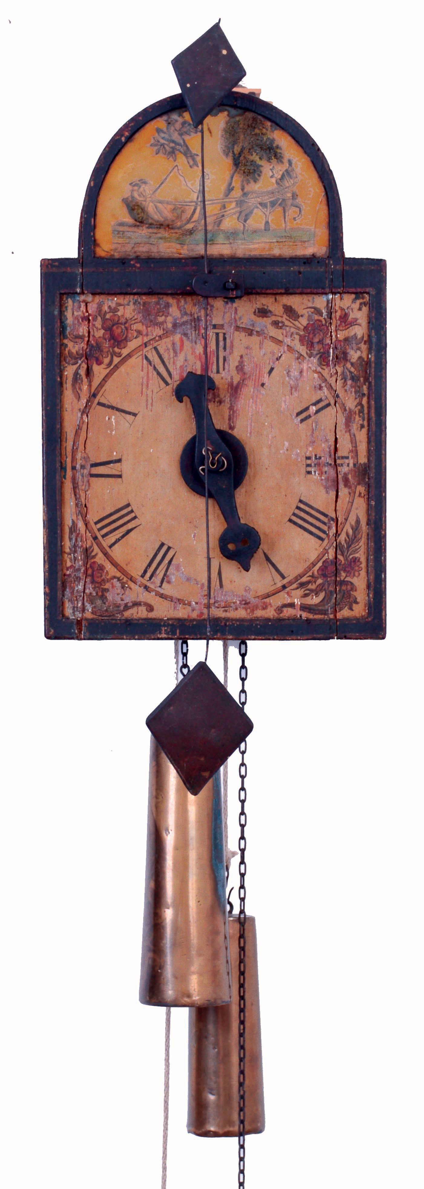 German, Black Forest, early wooden works, arch dial time and alarm clock, weight driven pinwheel escapement movement, with rare front hung compound pendulum, Alarm rings on original glass bell, first half 19th century — Antique Clocks Price Guide