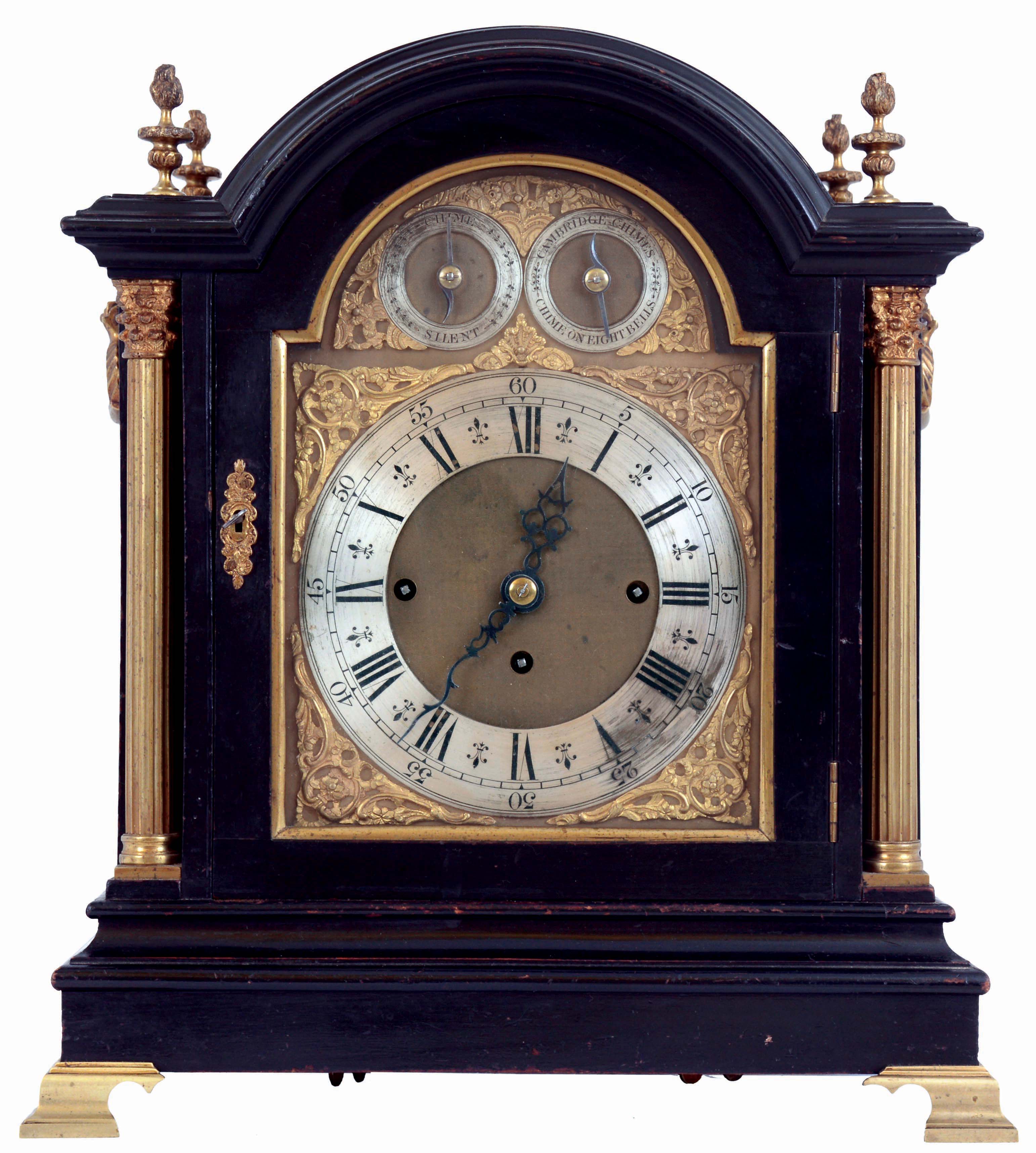 England, Victorian 3 train bracket clock, ebonized mahogany case in the Georgian style with gilt brass mounts and bracket feet, composite brass dial with Roman numeral silvered chapter ring, gilt spandrels, and matted center, strike controls in the arch, blued steel hands, substantial fusee movement with engraved back plate and pendulum, chiming the quarters on a nest of eight bells, and striking the hours on a large gong, c1880 — Antique Clocks Price Guide
