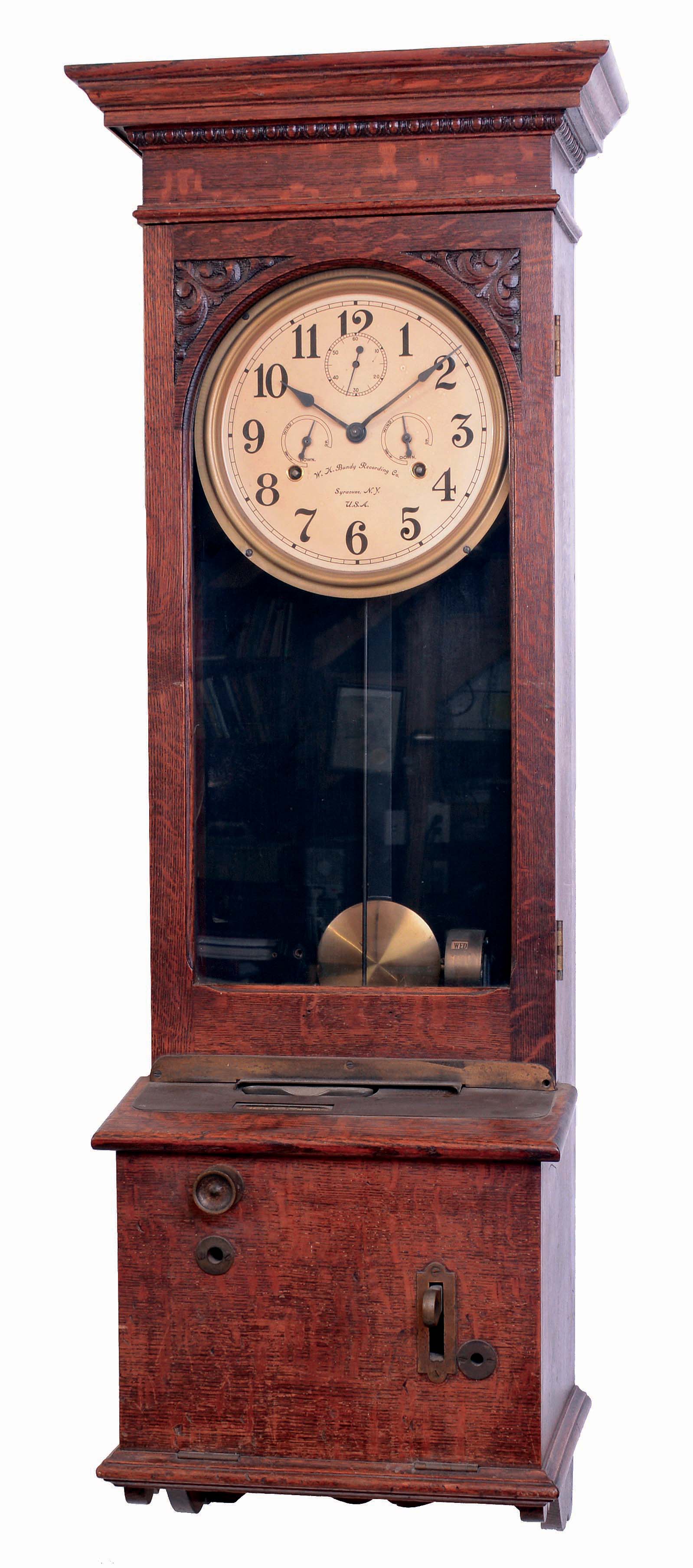 W.H. Bundy, Syracuse, NY, time recording, 8 days, time only twin-mainspring oak wall clock, c1895 — Antique Clocks Price Guide