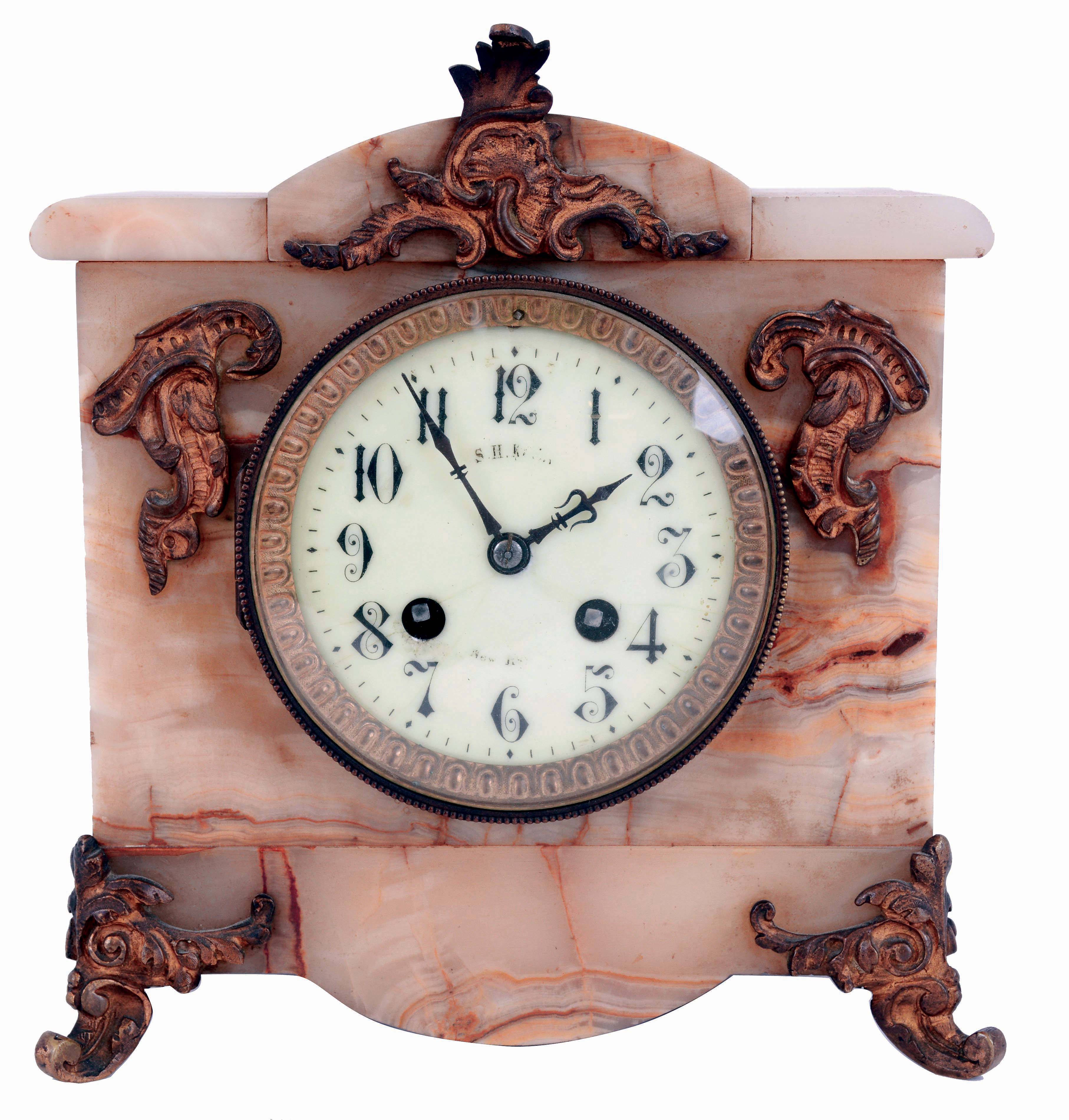 French onyx, 8 days, time and strike, mantel clock with cast gilt metal feet and ornaments, c1900 — Antique Clocks Price Guide