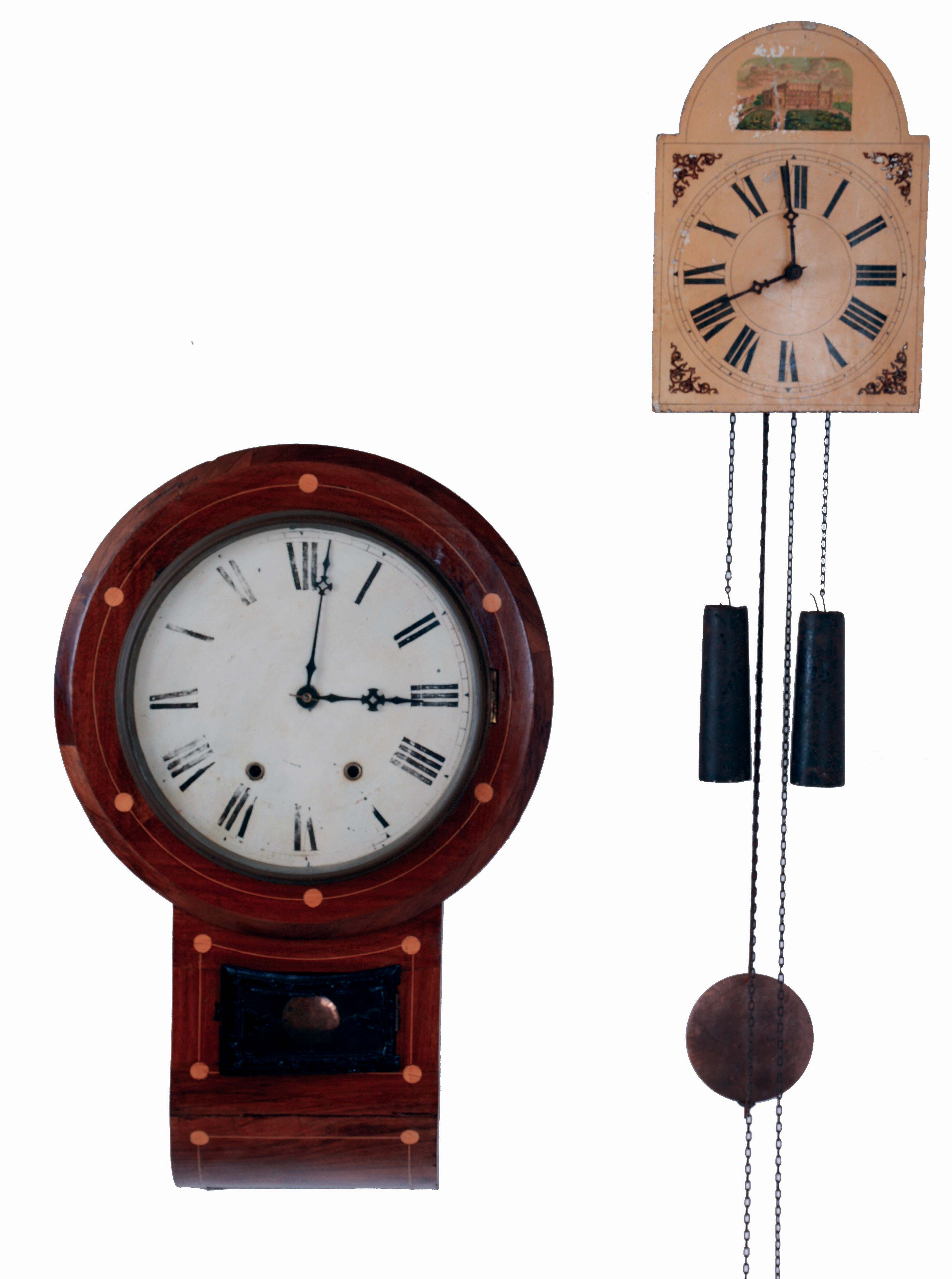 Clocks- 2 (Two): Anglo- American wall clock, mahogany veneered drop dial case, Roman numeral white painted dial, 8 day time and strike movement, and a Black Forest shield dial clock, Roman numeral painted dial, thirty hour weight driven movement with wooden plates, iron weights, both late 19th century — Antique Clocks Price Guide