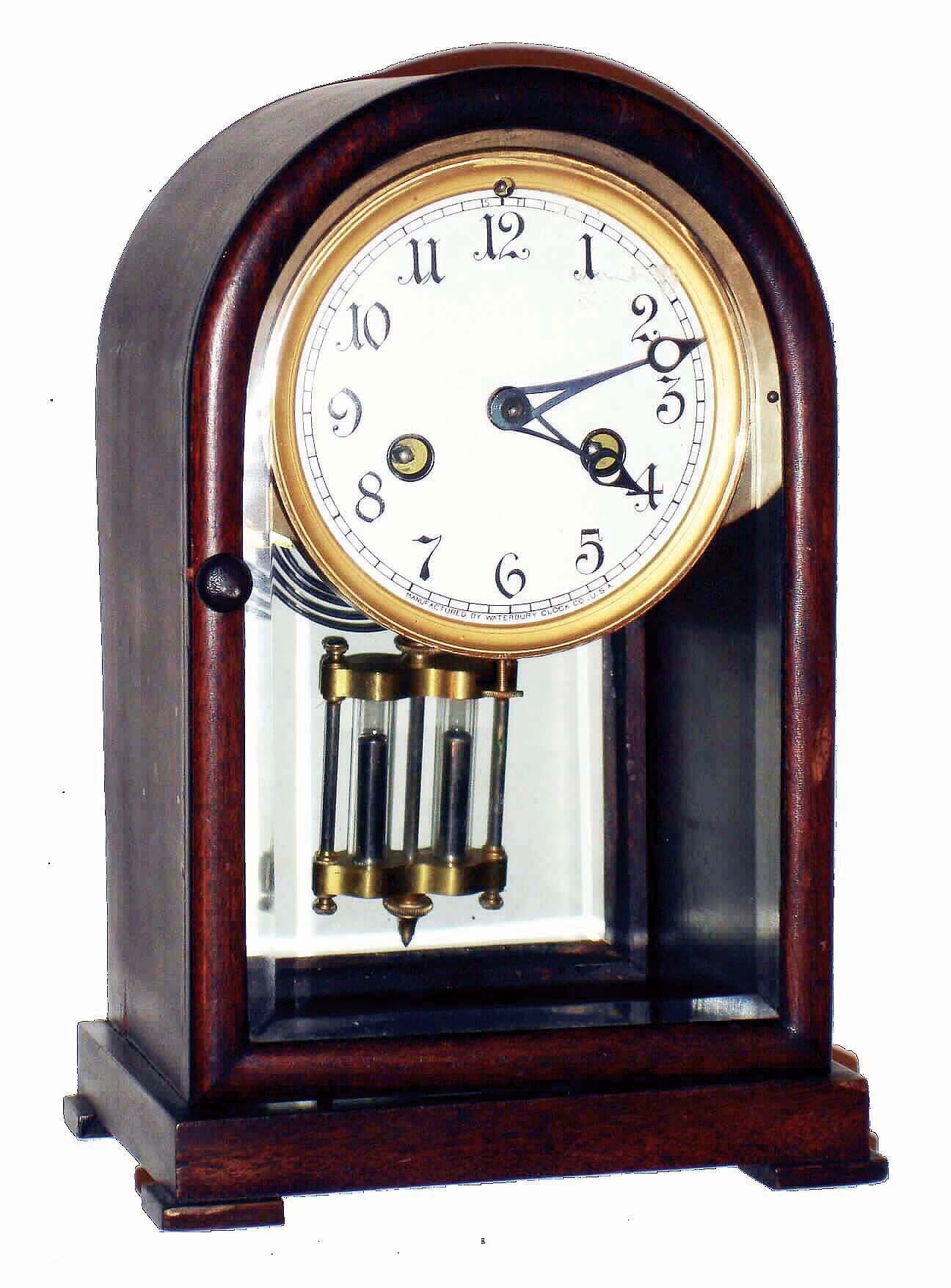 Clocks- 2 (Two) American shelf clocks: (1) Waterbury Clock Co., Waterbury, Conn., "Marson" mahogany and beveled glass 8 days, time and strike crystal regulator, c1917; (2) Seth Thomas Clock Co., Thomaston, Conn., "Chime Clock No. 11", 8 days, time and strike, Westminster chime on four rods mantel clock, c1921. — Antique Clocks Price Guide
