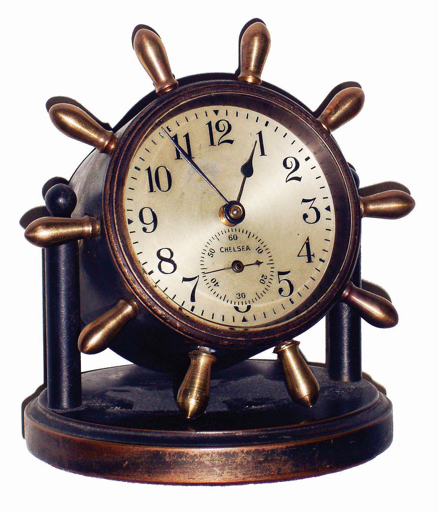 Chelsea Clock Co., Boston, Mass., "Clinton" bronze, 8 days, time only swivel head yacht wheel desk clock, 2 3/4" dial, c1930 — Antique Clocks Price Guide