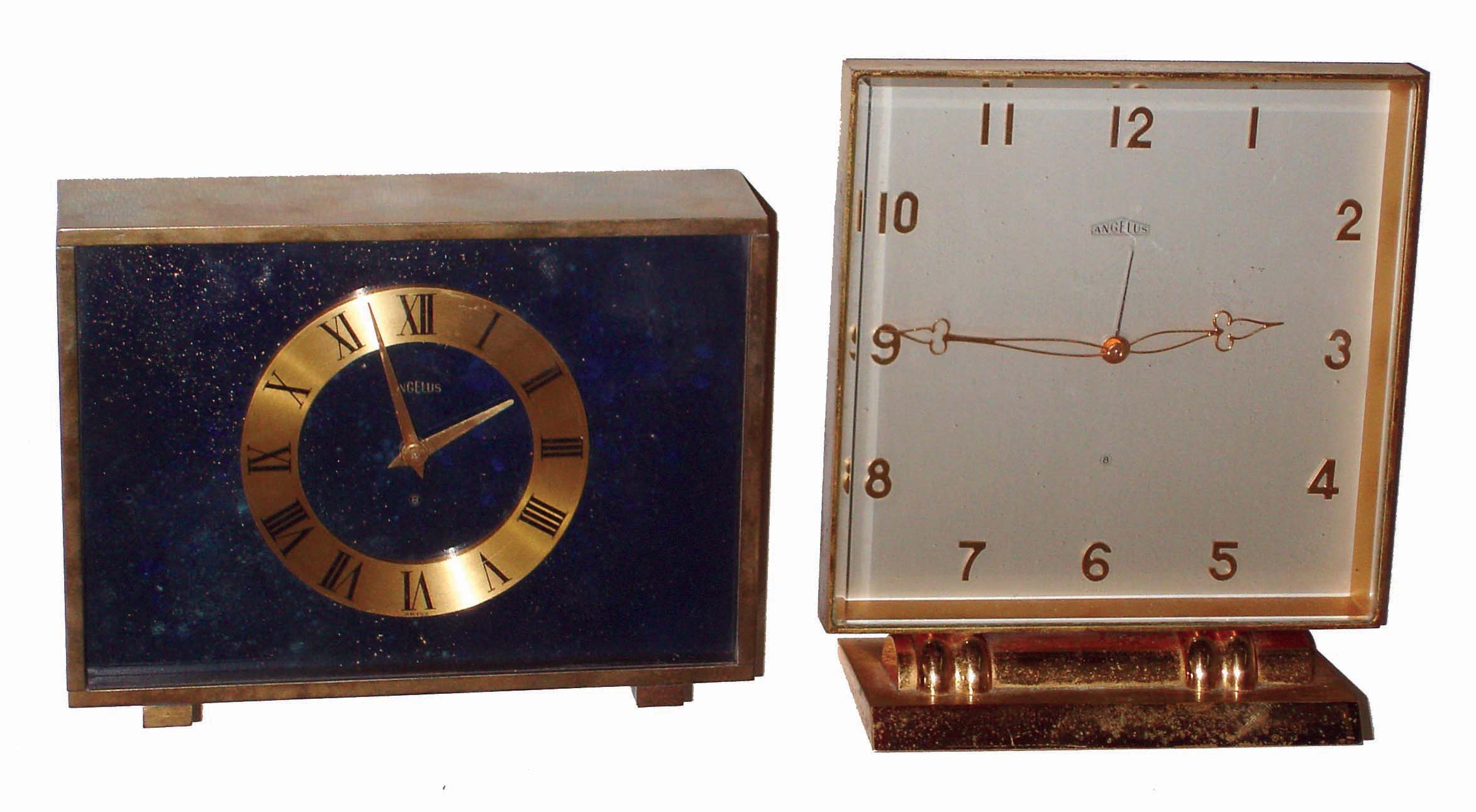 Clocks- 2 (Two) Angelus Swiss, 8 days, brass and glass alarm clocks; dark blue dial rectangular; tilted silvered dial, 15 jewel; c1975 — Antique Clocks Price Guide
