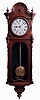 Welch, Spring, & Co., Forestville, Conn., "Regulator No. 1" wall clock, 8 days, time only double brass weight driven movement in a walnut case with a painted metal dial and black flocked backboard, c1880