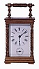 France, for Tiffany & Co., carriage clock in a glazed, gilt brass case, with twist turned columns and handle, Roman numeral white enamel dial, blued steel hands, 8 days, time and alarm movement with lever platform, c1900, together with a leather covered outer case from a larger clock