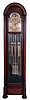 Revere Clock, Co., Cincinnati Ohio, (division of Herschede), "Hamilton" 9 tube tall clock playing three tunes, Westminster, Whittington and Canterbury with Telechron electric movement in a dome top mahogany case with beveled glass sides and trunk door, full length full reeded columns on bun feet. The brass dial has moon phase and silvered chapter ring with applied black numerals and spandrels, c1934