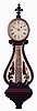 Boston area lyre clock, mahogany and mahogany veneer case with heavily molded base and acanthus carved bracket, throat panel with leaf and scroll carving and decorated tablet, brass bezel with convex glass, Roman numeral white painted metal dial, blued steel barbed hands, 8 days, weight driven timepiece movement, c1830 with alterations.