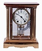Seth Thomas Clock Co., Thomaston, Conn., "Empire No. 64" crystal regulator, 8 days, time and strike, spring driven movement, polished brass and glass case, c1909.
