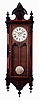 Wm. L. Gilbert Clock Co., Winsted, Conn., "Regulator No. 3", 8 days, weight driven brass movement wall timepiece with applied castings and turned finials, c1875