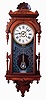 F. Kroeber & Co., New York, NY, "Regulator No. 33" wall clock, 8 days, time and strike, spring driven movement in a walnut case with burled accents with a papered metal dial and acid etched lower tablet, c1880
