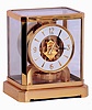 Jaeger- LeCoultre, Switzerland Atmos clock, cal.528-8, gilt, rectilinear glazed case, the base with cotes de Geneve decoration, Arabic numeral and arrow marker white painted dial, gilt hands with black tips, 15 jewel gilt movement, serial #555799, c1975
