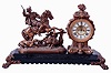 Ansonia Clock Co., New York, NY, "Boar Hunter" bronzed spelter, on enameled iron base, 8 days, time and strike, figural mantel clock, visible escapement, c1894
