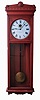 Self Winding Clock Co., New York, NY, "No. 9 Self Winding Regulator" wall clock, time only, electric movement with a 60 beat pendulum in a cherry finished oak case with painted metal dial, c1908