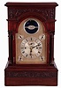 English, rare tellurium chiming clock movement with vertical orrery, NOW ASSOCIATED with a modified mahogany case, the three train movement with calendar indications, months above center shaft, days of the week to the left, and date to the right, c1890.