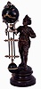 Miniature French Swinger, signed "Aug. Moreau", the patinated spelter figure of a young boy wearing a tam-o-shanter cap, and with a bag slung over his left shoulder, his right hand raised and supporting the miniature swinging timepiece, 8 day, key wound movement contained in a dark green sphere with gilt Roman numerals and Louis XV hands, and 3 rod "gridiron" terminating in a smaller green sphere with gilt equatorial band, c1890