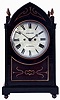 Dewhurst, Clitheroe, England, bracket clock, the lancet arch form oak case with ebony moldings, veneers, and brass inlay, pierced brass gothic frets at the case sides and with pineapple finials, brass bezel with convex glass, Roman numeral white painted convex sheet iron dial, blued steel Breguet style hands, 8 days, time and strike fusee movement sounding the hours on a large bell, c1825