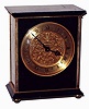 Gubelin, Swiss, 8 days, time and strike, painted black and lacquered brass desk clock, c1970