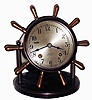 Chelsea Clock Co., Boston, Mass., "Vanderbilt" yacht wheel swivel head, 8 days, ship's bells desk clock, bronze finish, hinged bezel, #631082, c1957