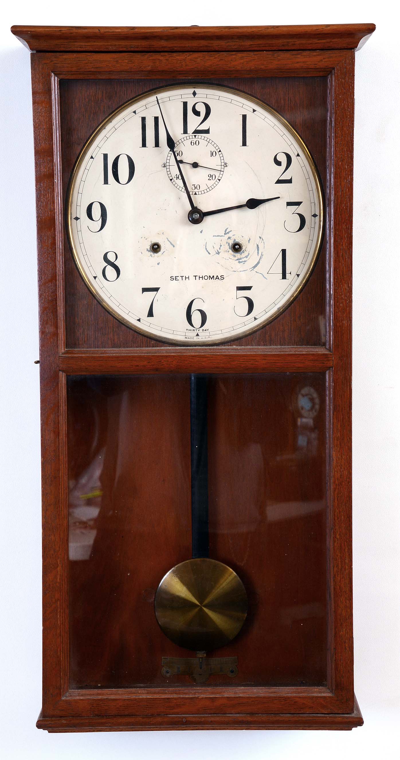 Seth Thomas Clock Co., Thomaston, Conn., "Office No. 16" wall clock with a 30 days spring driven brass timepiece movement (86W) with Graham dead beat escapement in an oak case. — Antique Clocks Price Guide