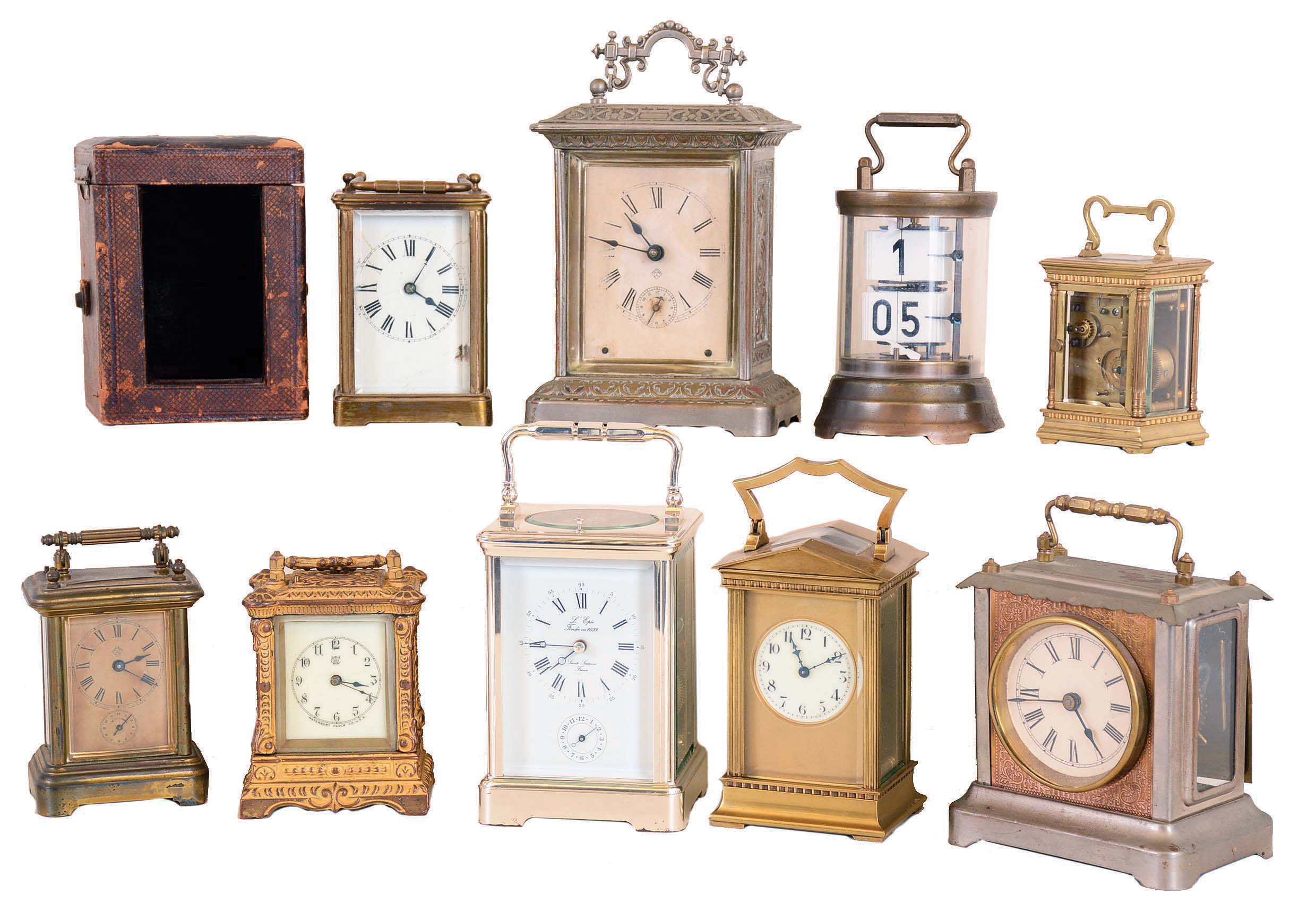 Clocks- 9 (Nine) Carriage French and American including "Plato" clock by Horolovar. French 8 day models include modern L'Epee repeater with alarm, architectural time only, and miniature with alarm. Americans include Seth Thomas Clock Co., Thomaston, Conn., "Carriage No. 1" in French style with carrying case, Waterbury ornate cast metal, and Ansonia. — Antique Clocks Price Guide