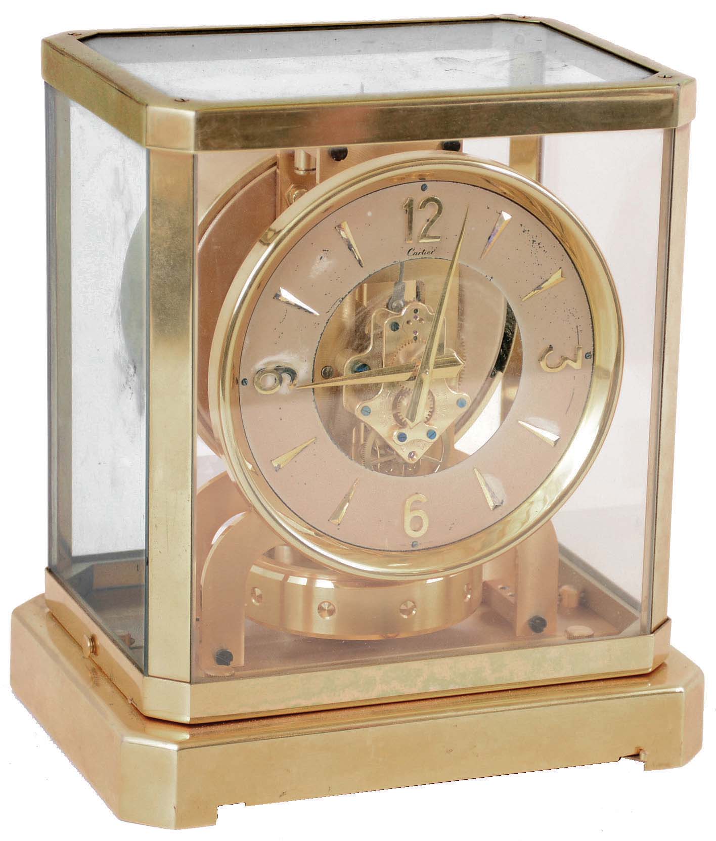 LeCoultre, Switzerland, for Cartier, Atmos clock, gilt, 15 jewel calibre 519 movement, Arabic numeral and arrow marker silvered dial, signed "Cartier" below 12, gilt case with glazed dome, serial #36412, c1950 — Antique Clocks Price Guide