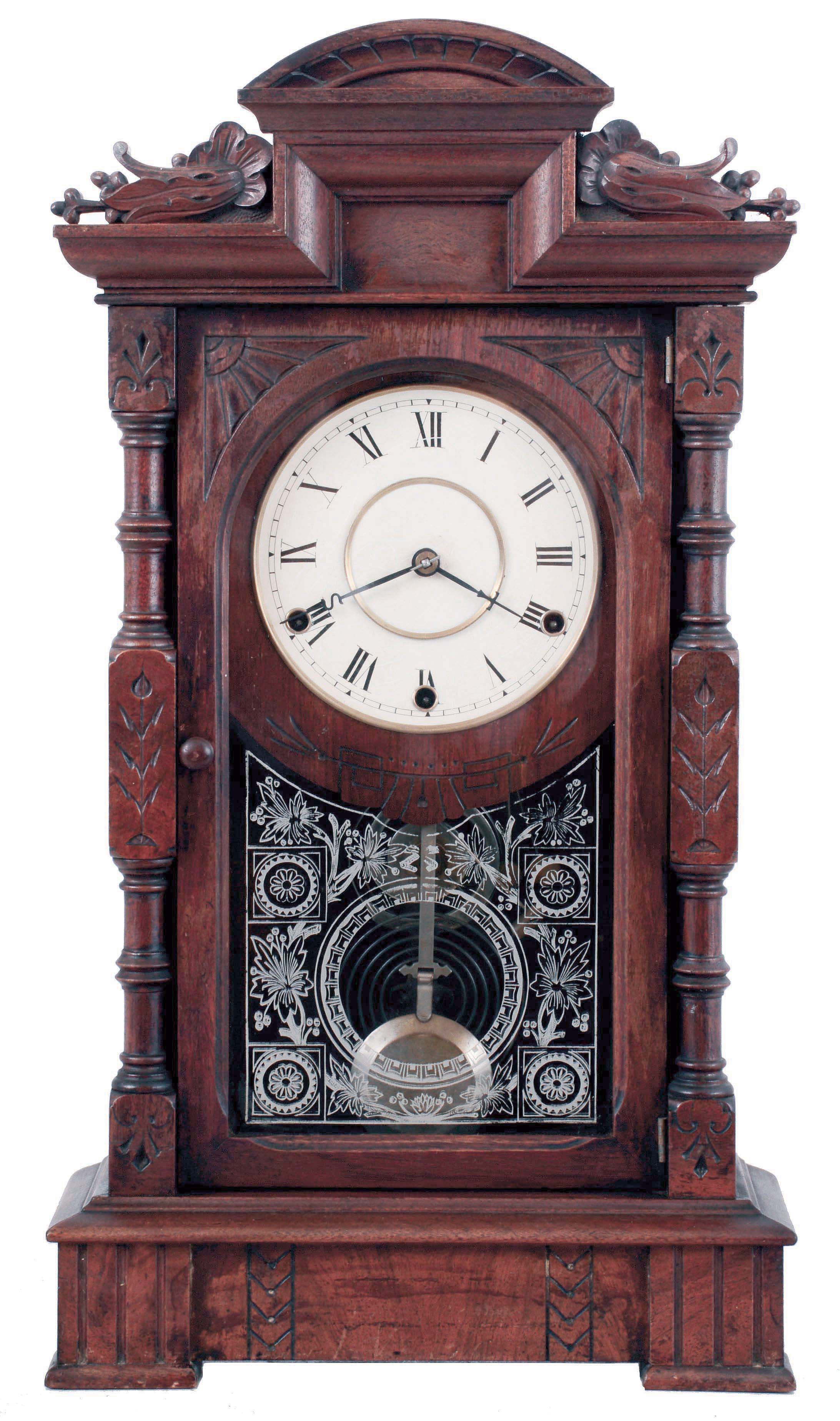 Seth Thomas Clock Co., Thomaston, Conn., "Hecla" shelf clock in a walnut case with a spring driven, 3 train movement striking the hours on a cathedral gong and the quarter hours on two cup bells, c1885. — Antique Clocks Price Guide