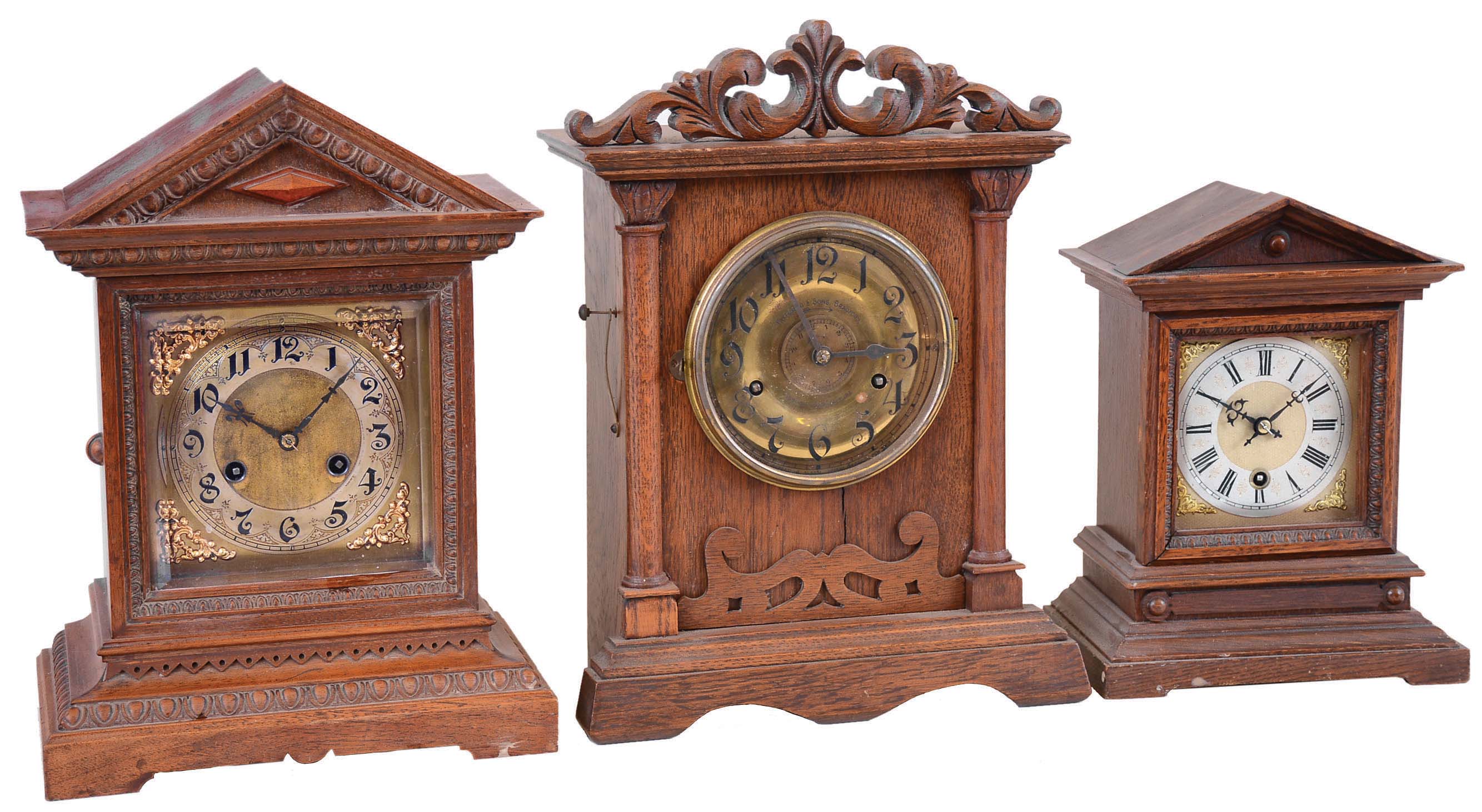 Clocks- 3 (Three) 8 day hardwood case mantel clocks: Two German (one timepiece, one striking): by Junghans; One English time, strike & alarm by Fattarini & Sons, time, strike and alarm; early 20th century — Antique Clocks Price Guide