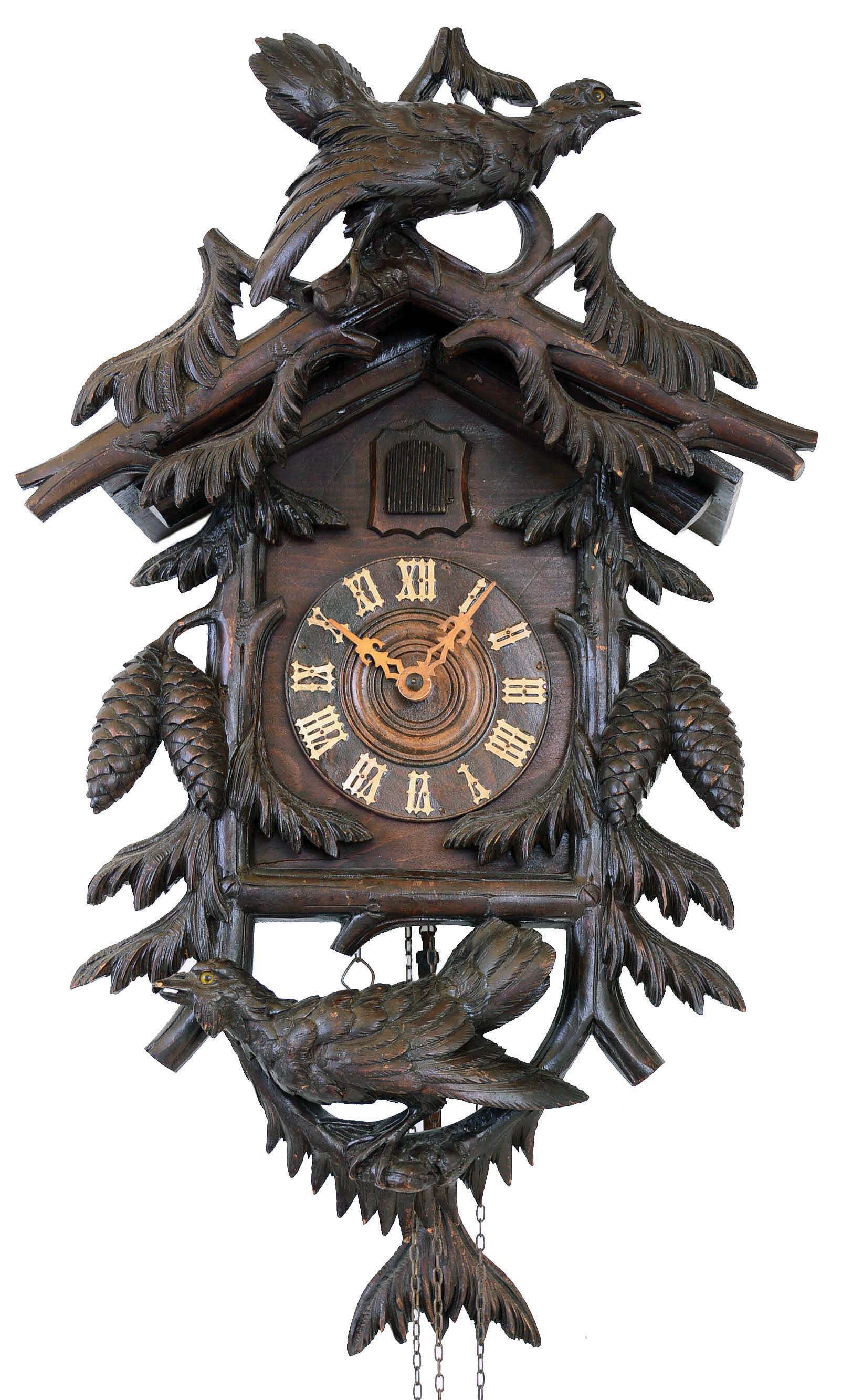 Cuckoo Clock, Black Forest, Germany, 30 hour carved dark-stained wood with two large birds with glass eyes, c1890 — Antique Clocks Price Guide