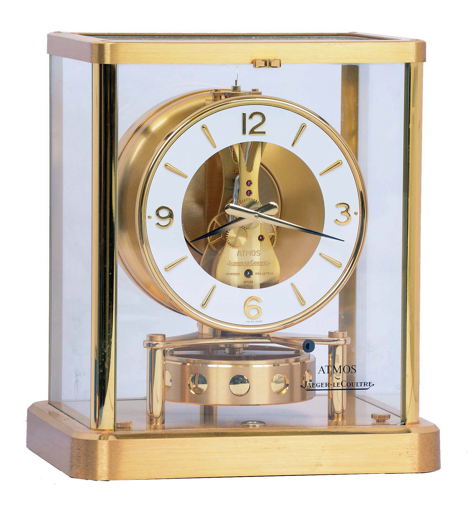 LeCoultre, Switzerland, "Atmos" gold-plated brass and glass mantel clock wound by atmospheric changes, serial #658529. — Antique Clocks Price Guide