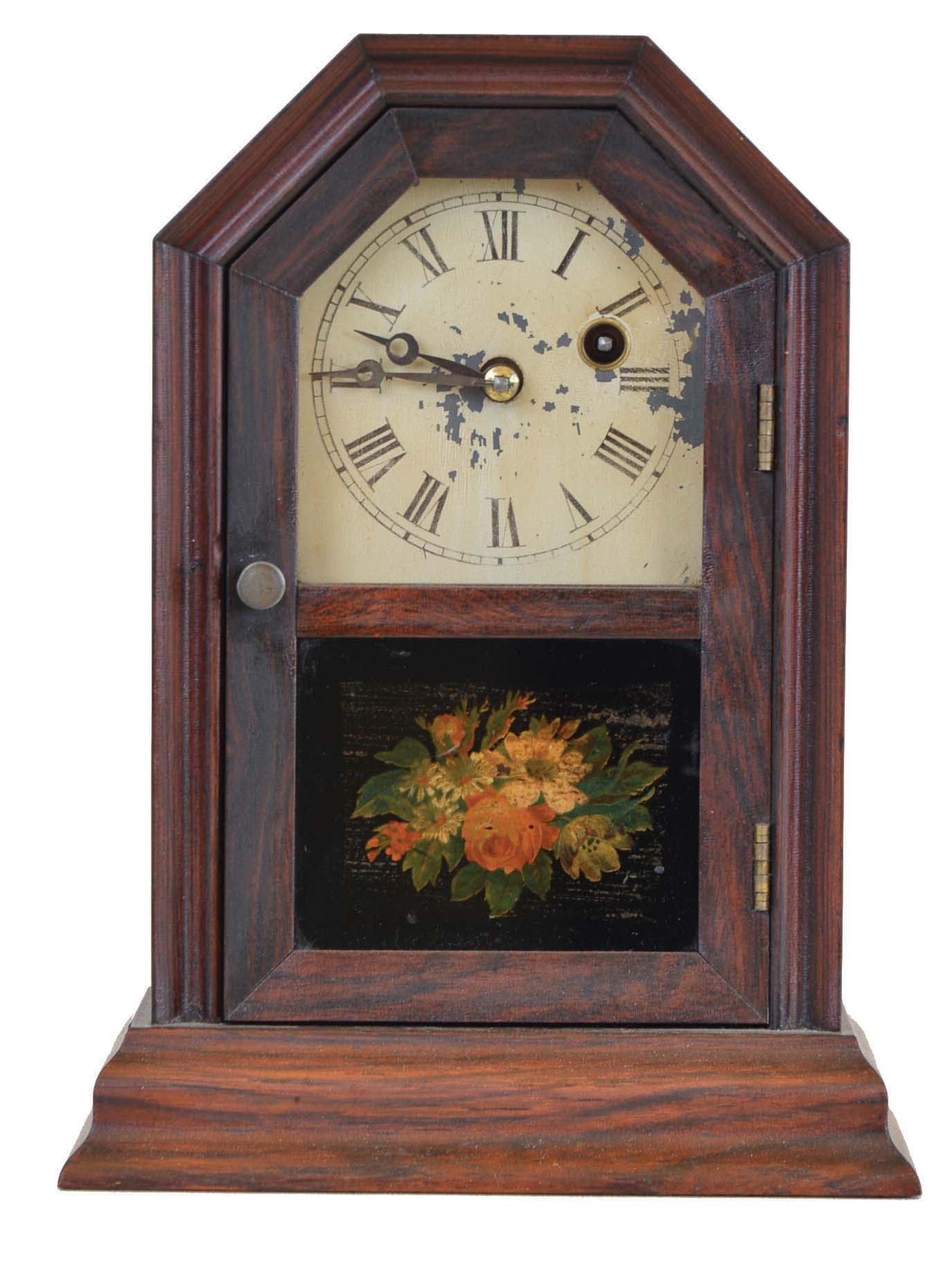 Atkins Clock Co., Bristol, Conn., "Octagon Top" Cottage Clock with a 30 hours spring-driven brass timepiece movement in a rosewood veneered case. — Antique Clocks Price Guide