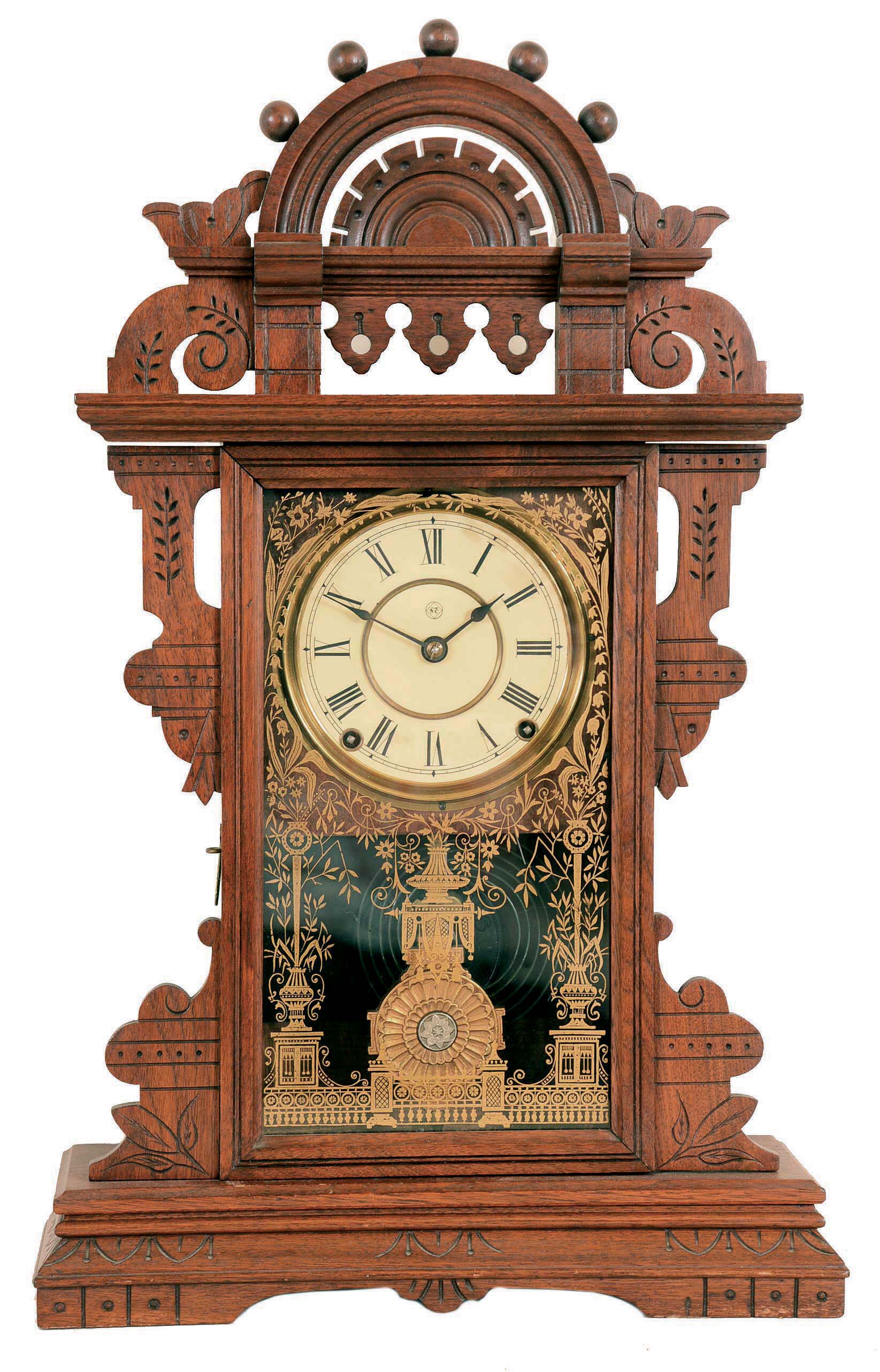 Seth Thomas Clock Co., Thomaston, Conn., "Eclipse" shelf clock with a spring driven 8 days time and strike (half hour) Lyre movement in a walnut case. — Antique Clocks Price Guide