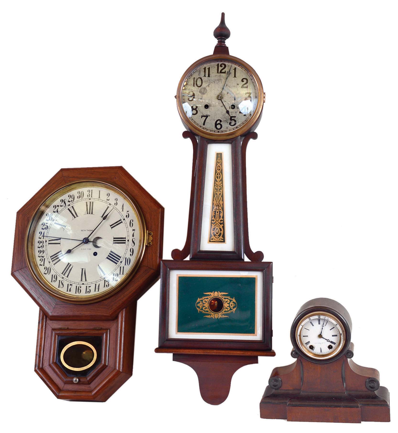 Clocks- 3 (Three) 8 day American wood: (1) New Haven "Waring" time and strike banjo, c1925; (2) Seth Thomas time and calendar drop octagon, c1920; (3) Seth Thomas Sons & Co., New York, model #500, 8 (or 15) day, time & strike mantel c1872. — Antique Clocks Price Guide