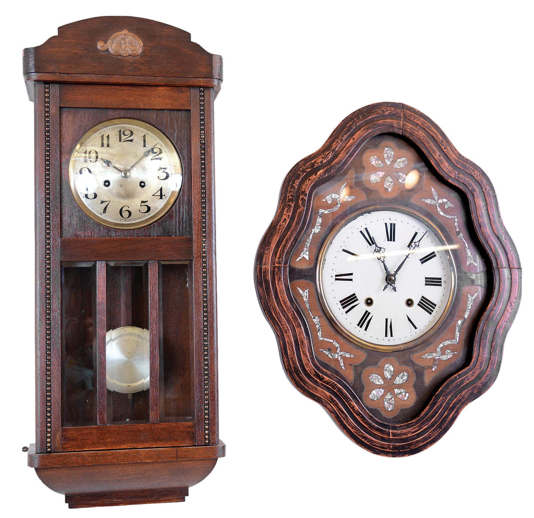 Clocks- 2 (Two) European 8 day time and strike spring-driven wall clocks: (1) French Morbier 8 day spring-driven "baker's clock" with mother-of-pearl inlay and reverse-painted glass dial; (2) German 8 day box regulator with two-tone striking; early 20th century — Antique Clocks Price Guide