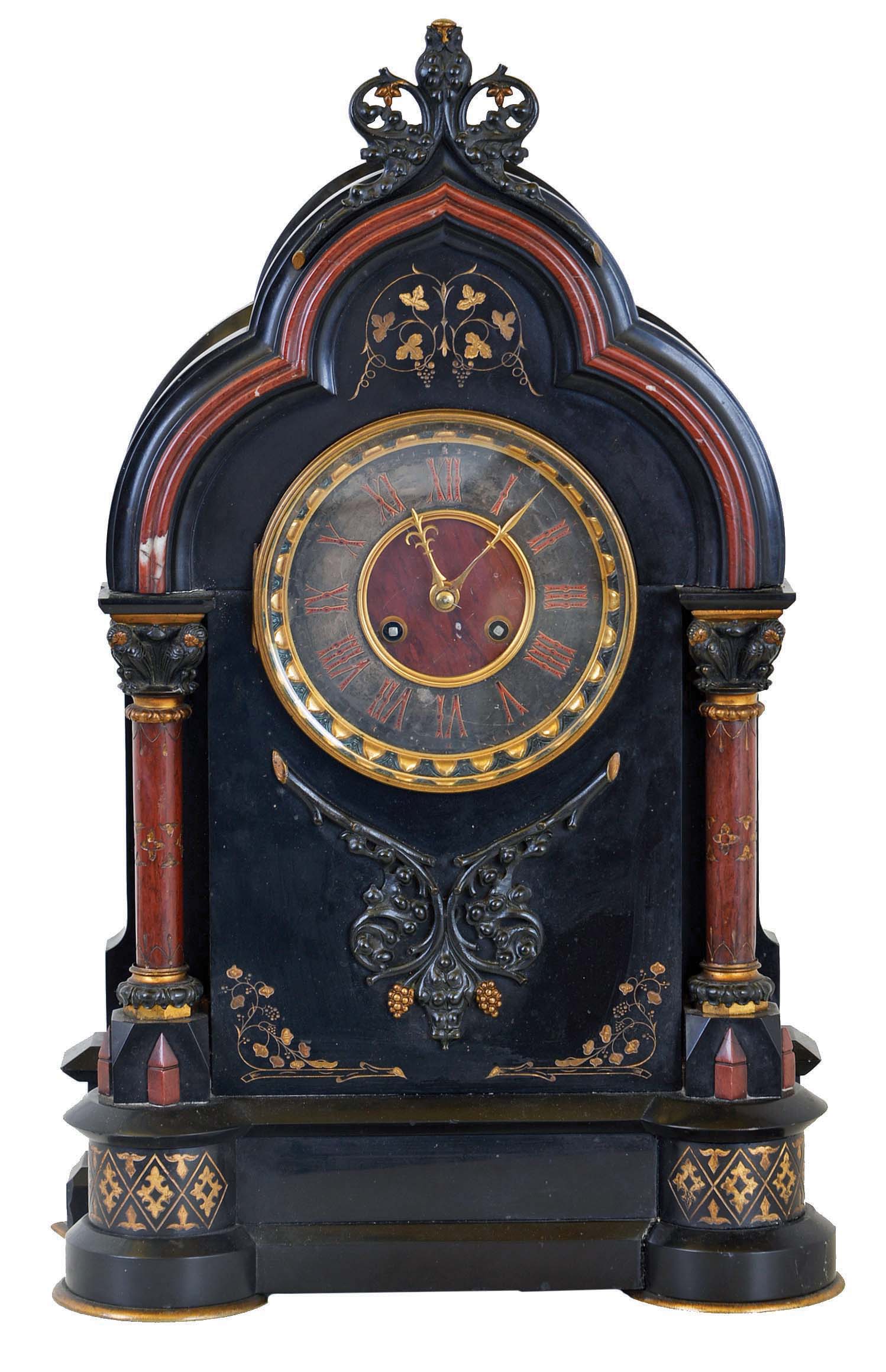 French, black marble & bronze mantel clock, with red marble columns and red trim moldings, and with incised gilt accents, and with 8 day gong strike movement. — Antique Clocks Price Guide