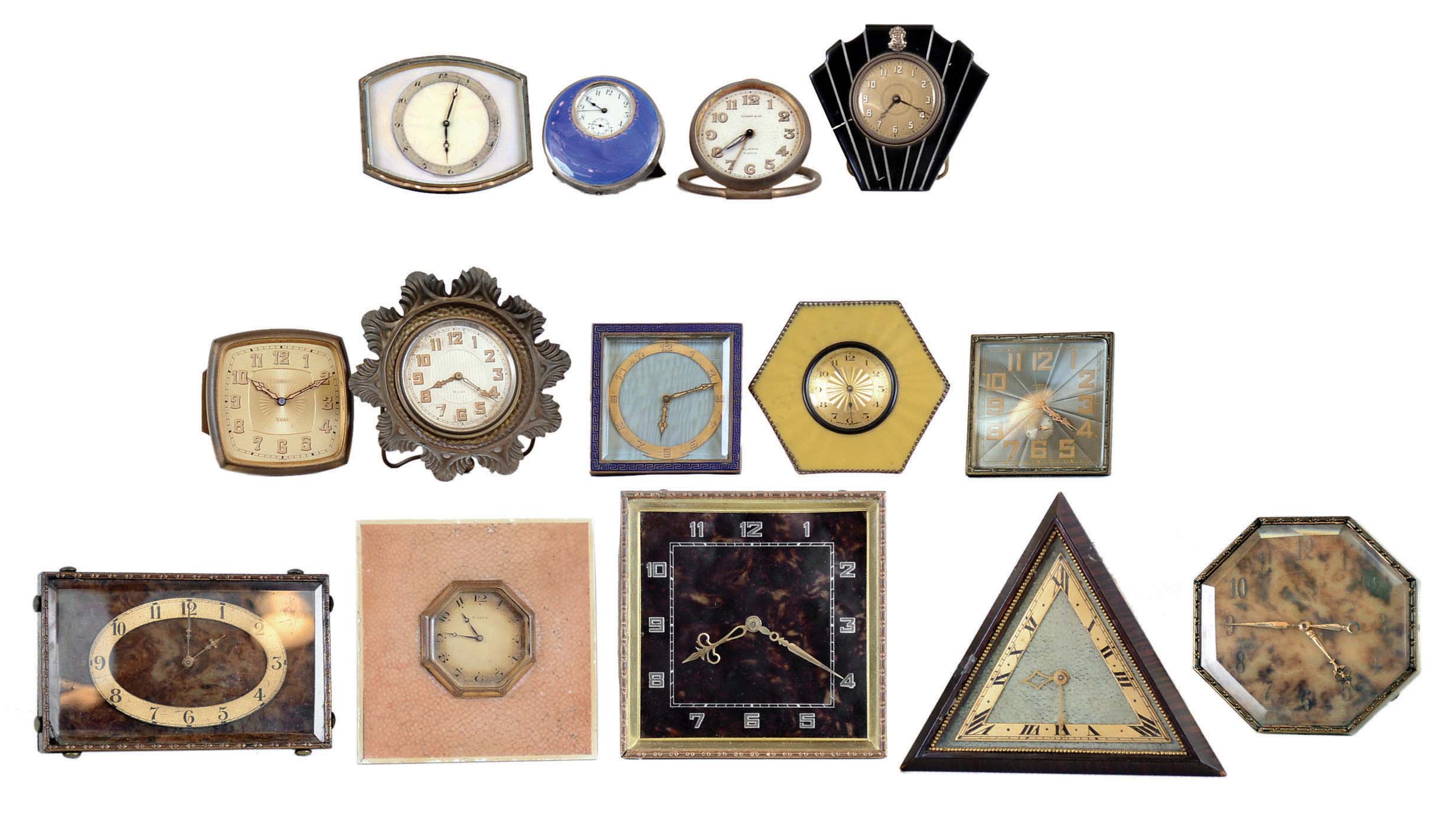 Clocks- 28 (Twenty-eight) European "strut" small metal case desk clocks, some 8 day, some with colorful enamel, nearly all antique and vintage. Makers include Waltham (German made) , Normis, Cyma for Gorham, J.E. Caldwell, Tiffany, and many unsigned — Antique Clocks Price Guide