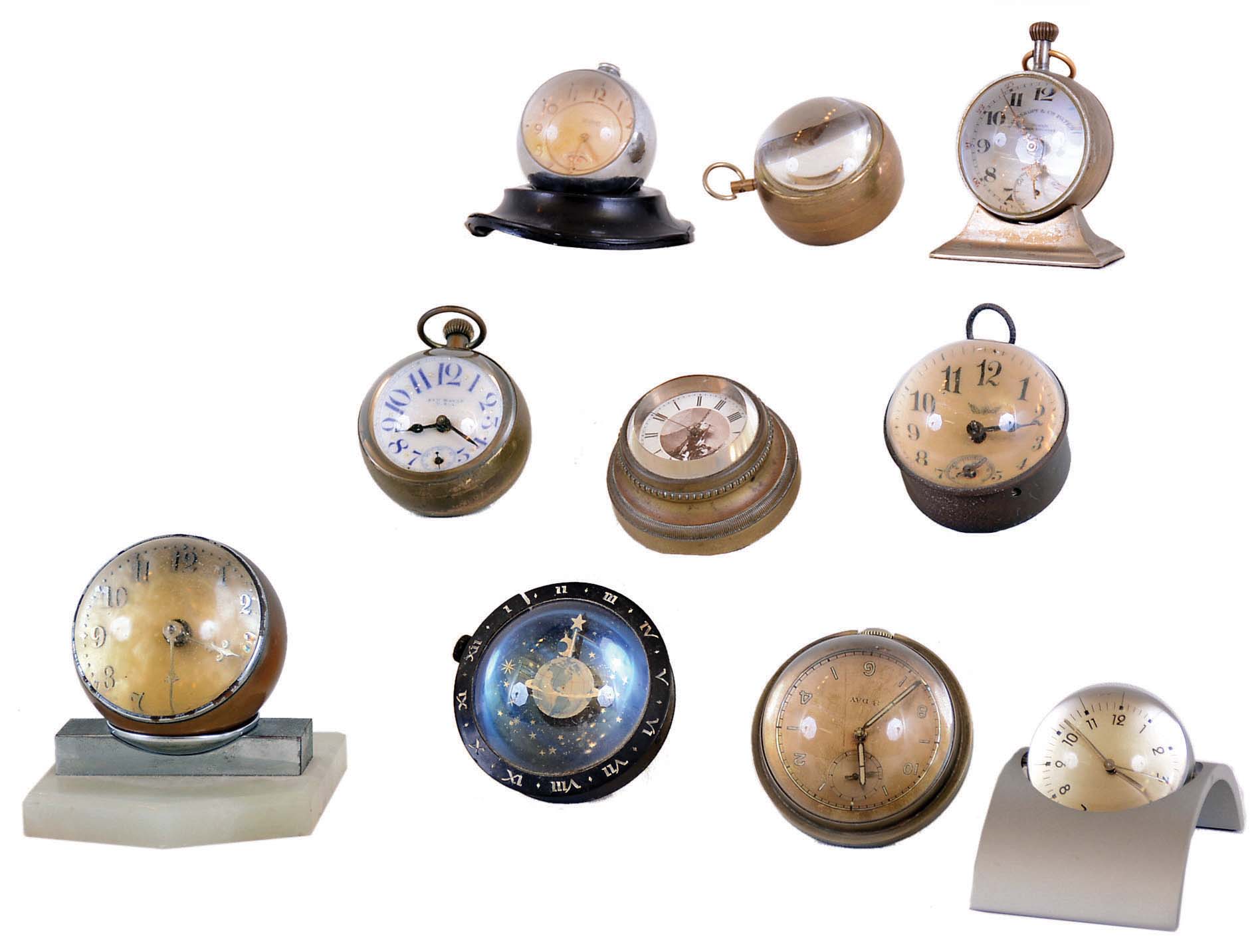 Clocks- 10 (Ten) "paperweight" small glass and metal desk clocks: maker and seller names include Imperial, Doxa, New Haven, Rosskopf, Westclox, Ingraham, and others unsigned, mostly vintage — Antique Clocks Price Guide