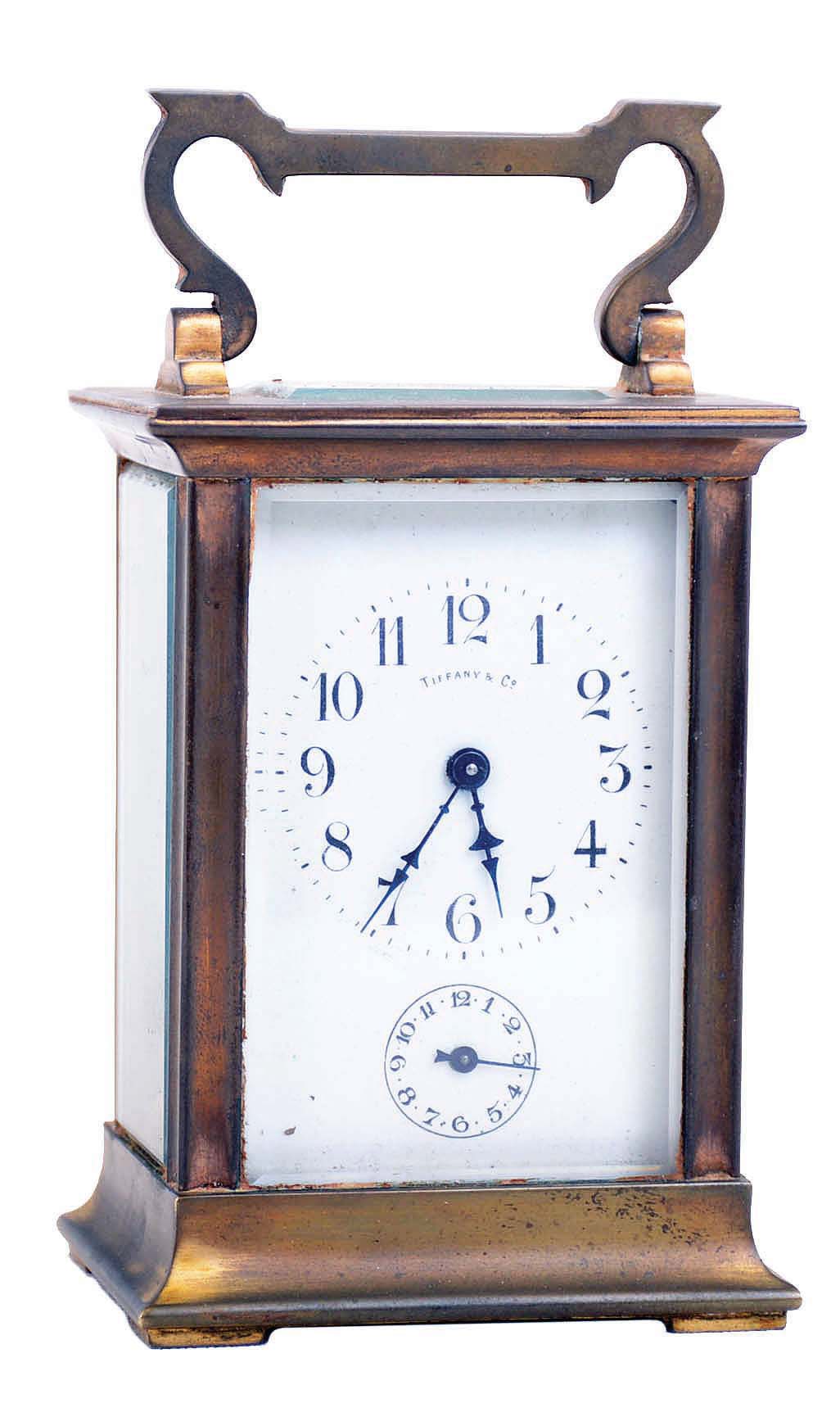 France, for Tiffany, 8 day time and alarm brass and beveled glass carriage clock. — Antique Clocks Price Guide