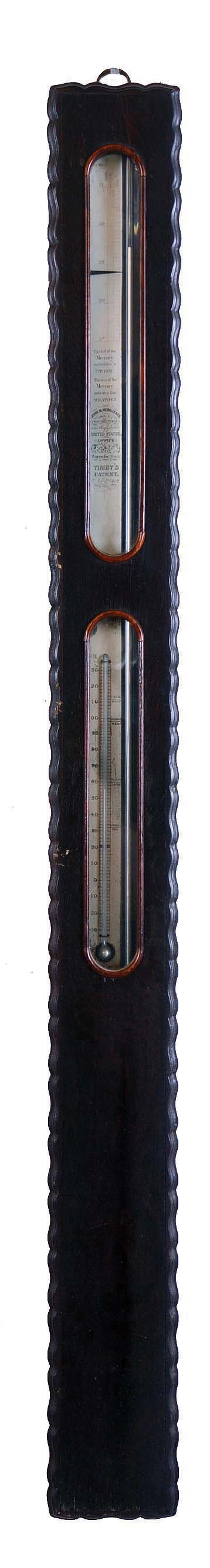 John M. Merrick & Co., 7 Central Exchange, Worcester, Mass., Timby patent stick barometer, rosewood veneered case with ripple molding on sides with silvered barometer scale with set hand, lower glass for thermometer, the back with label "No. 5" and patent information. — Antique Clocks Price Guide