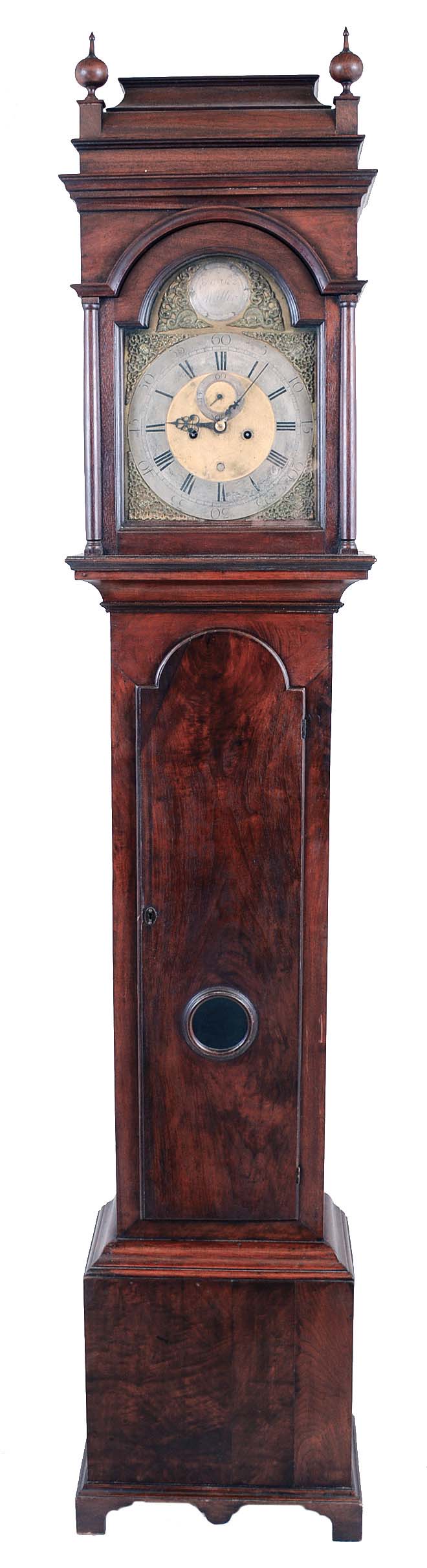 Aaron Miller, Elizabethtown, NJ, 8 days, time and bell strike, weight driven movement in a mahogany case with sarcophagus top, pendulum aperture on case door, resting on straight bracket feet. The brass dial has silvered chapter ring, cast brass spandrels, second's bit, calendar aperture and maker's boss. — Antique Clocks Price Guide