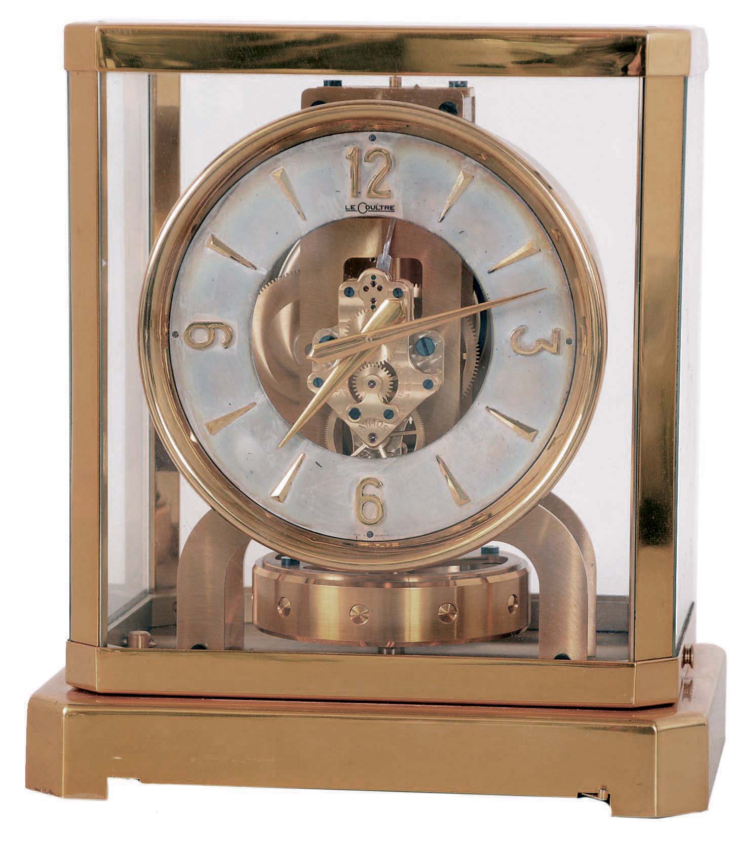 LeCoultre, Switzerland, "Atmos" perpetual gold-plated brass and glass time only mantel clock, serial number 64399 — Antique Clocks Price Guide