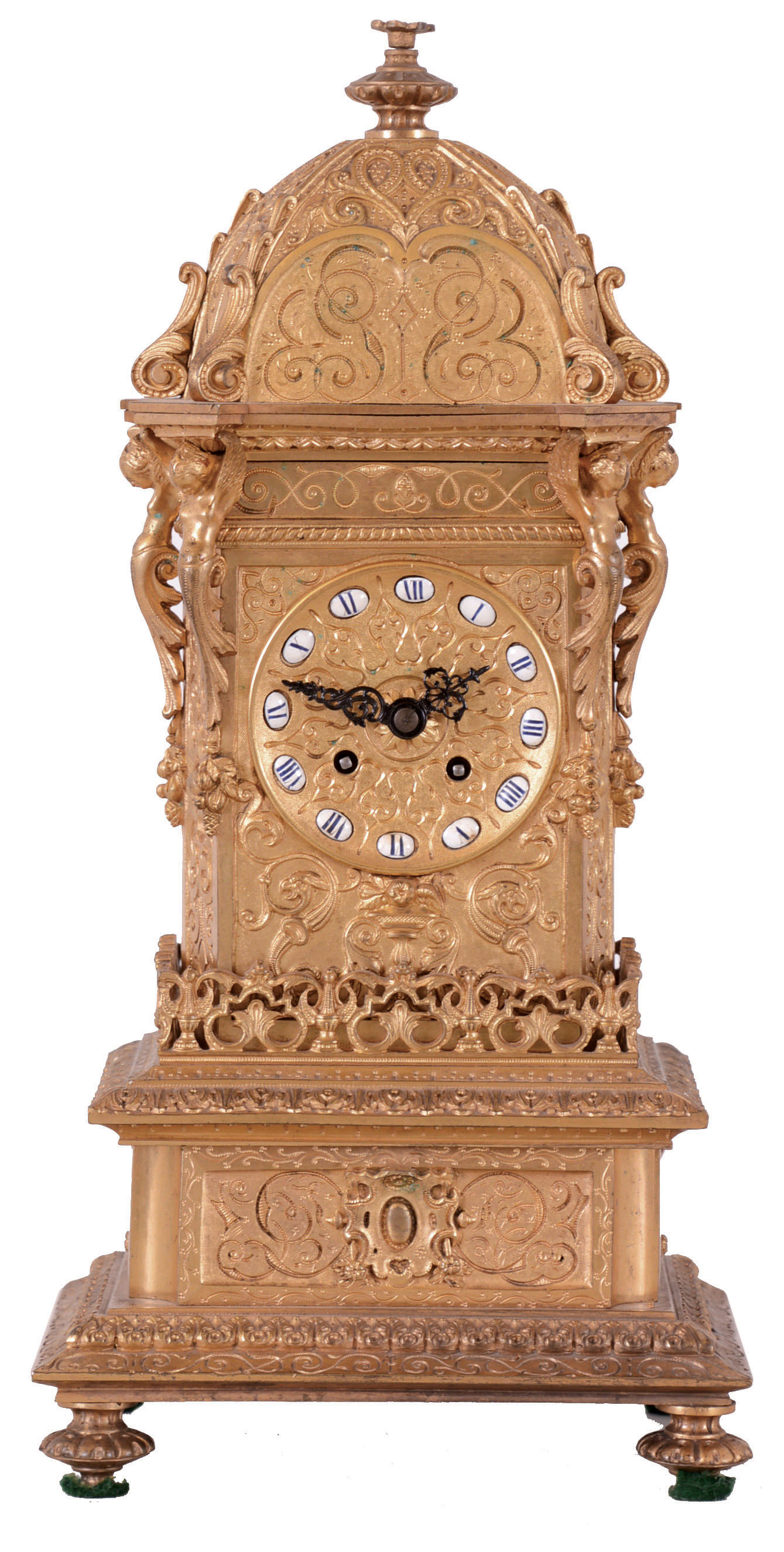 Vincenti & Cie, Paris, France brass architectural mantel clock, 8 days, time and bell strike, spring driven movement with silk thread suspension in a stepped turret type case with pagoda top and profuse fancy cast brass trim and moldings. The brass dial has twelve small Roman numeral cartouches. — Antique Clocks Price Guide
