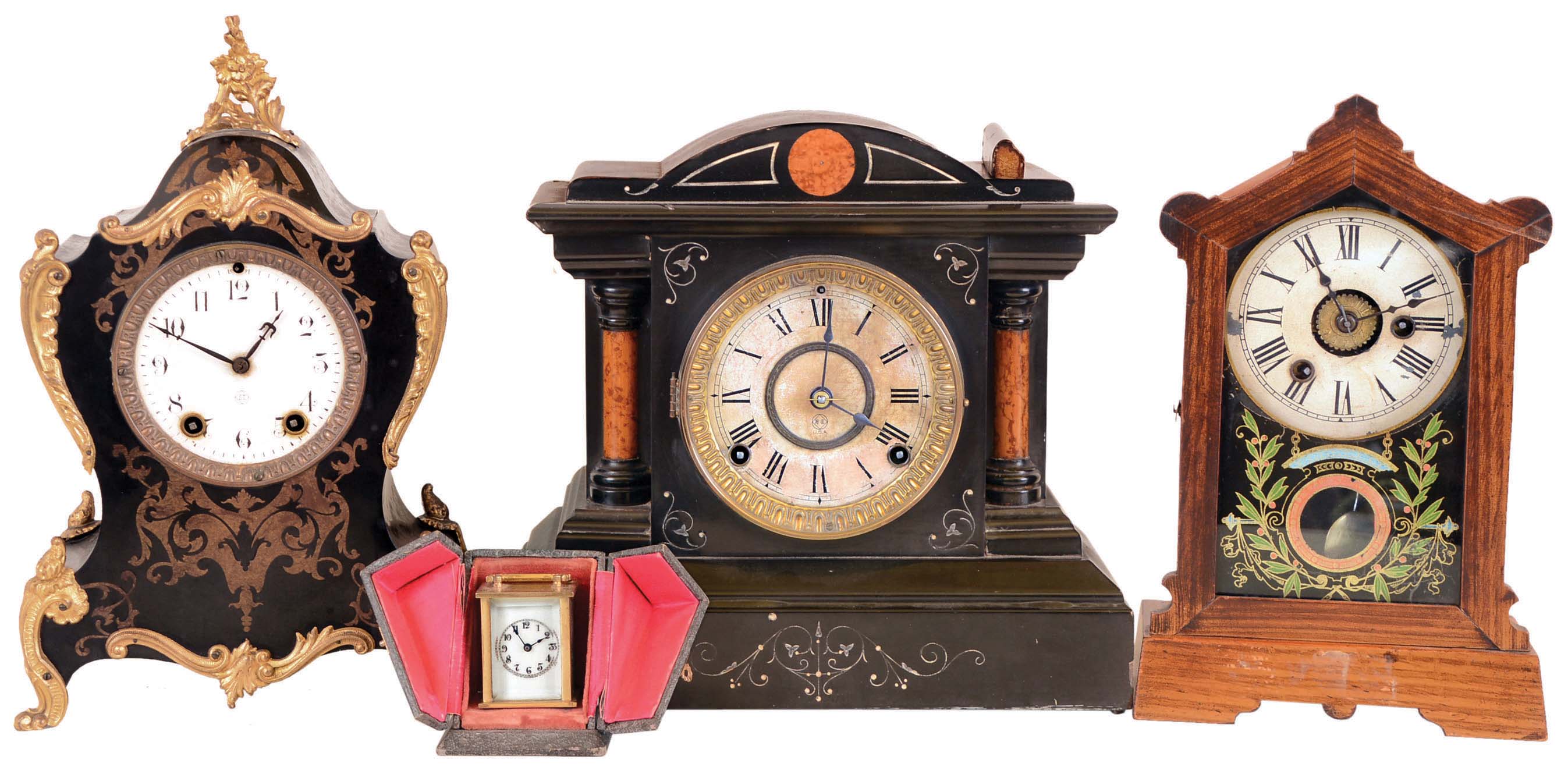 Clocks- 4 (Four): Philip Haas & Sohne German 30 hour time and alarm grain painted cottage clock; Seth Thomas black enamel wood 8 day time and strike mantel; Waterbury "Speck" 30 hour time only carriage clock with carrying case; and Seth Thomas black enameled wood Neuchatel style 8 day time and strike mantel; early 20th century — Antique Clocks Price Guide