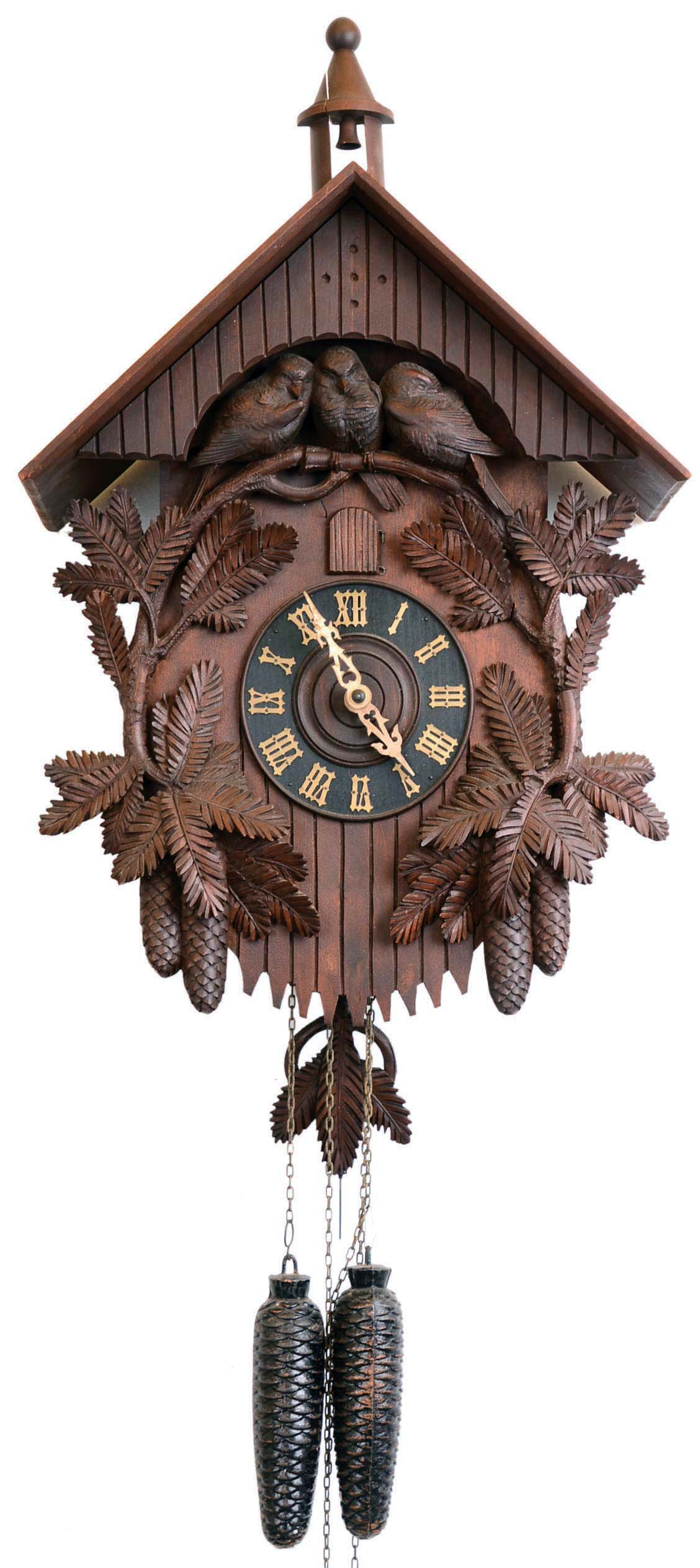Clocks- 2 (Two) German Black Forest carved walnut and oak 2 weight 30 hour cuckoo wall clocks with birds: one movement stamped "Schwarzw.Ind.Ausstellung, Freiburg, Baden"; other with two pairs of birds has running rabbit brass pendulum hanger; early 20th century — Antique Clocks Price Guide