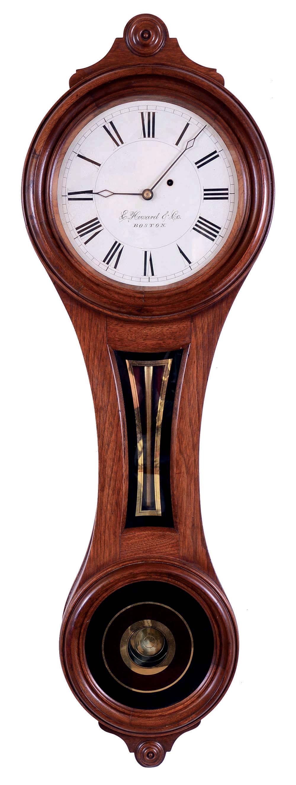 E. Howard & Co., Boston, Mass., "No. 8 Regulator" figure eight, wall clock, 8 days, time only, weight driven movement in a walnut case with a painted metal dial and reverse painted throat and lower tablets. — Antique Clocks Price Guide