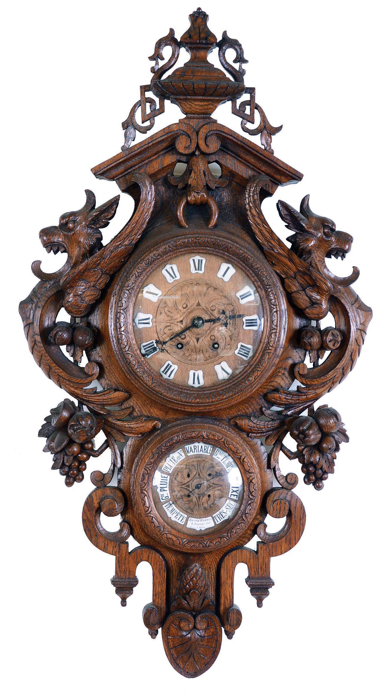 France, wall clock with barometer signed "Maison Wurtel E. Piefort Sucr a Paris", 8 days, time and strike, spring driven movement in an elaborately carved oak case featuring griffins, hanging fruit and surmounted by an urn with wooden dials on barometer and clock face with cartouche Roman numerals and barometric conditions. — Antique Clocks Price Guide