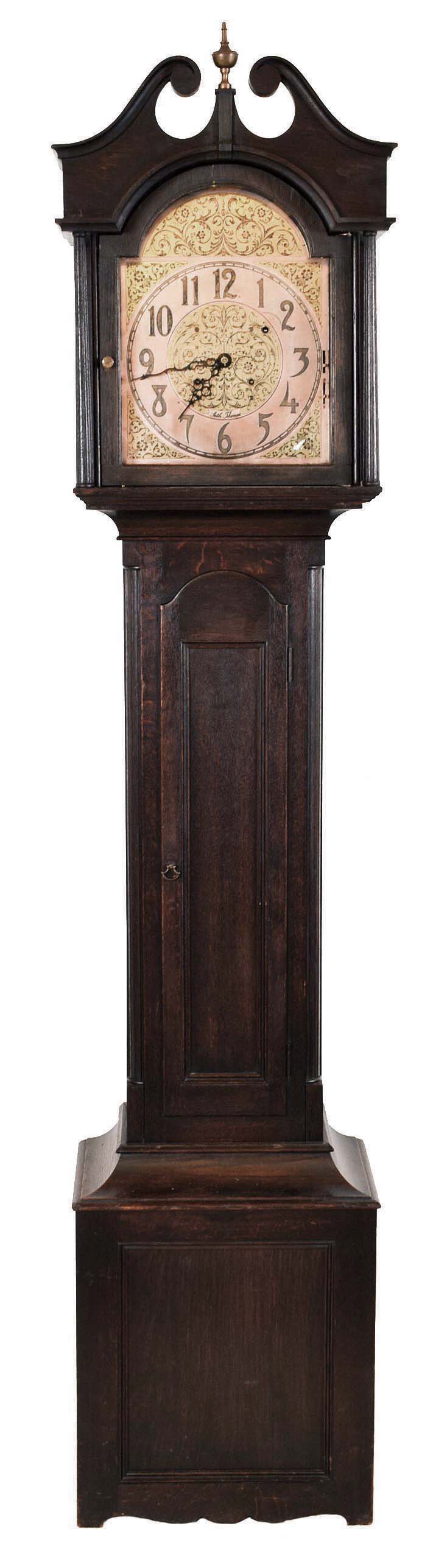 Seth Thomas Clock Co., Thomaston, Conn., "Hall Clock No. 40" with Sonora Chimes, 8 days, time, strike and chime on bells, triple spring driven movement in an dark finished oak case with a, brass dial with copper toned chapter ring and border. — Antique Clocks Price Guide